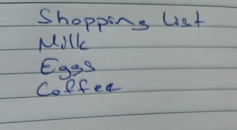 Handwritten shopping list — Milk, Eggs, Coffee